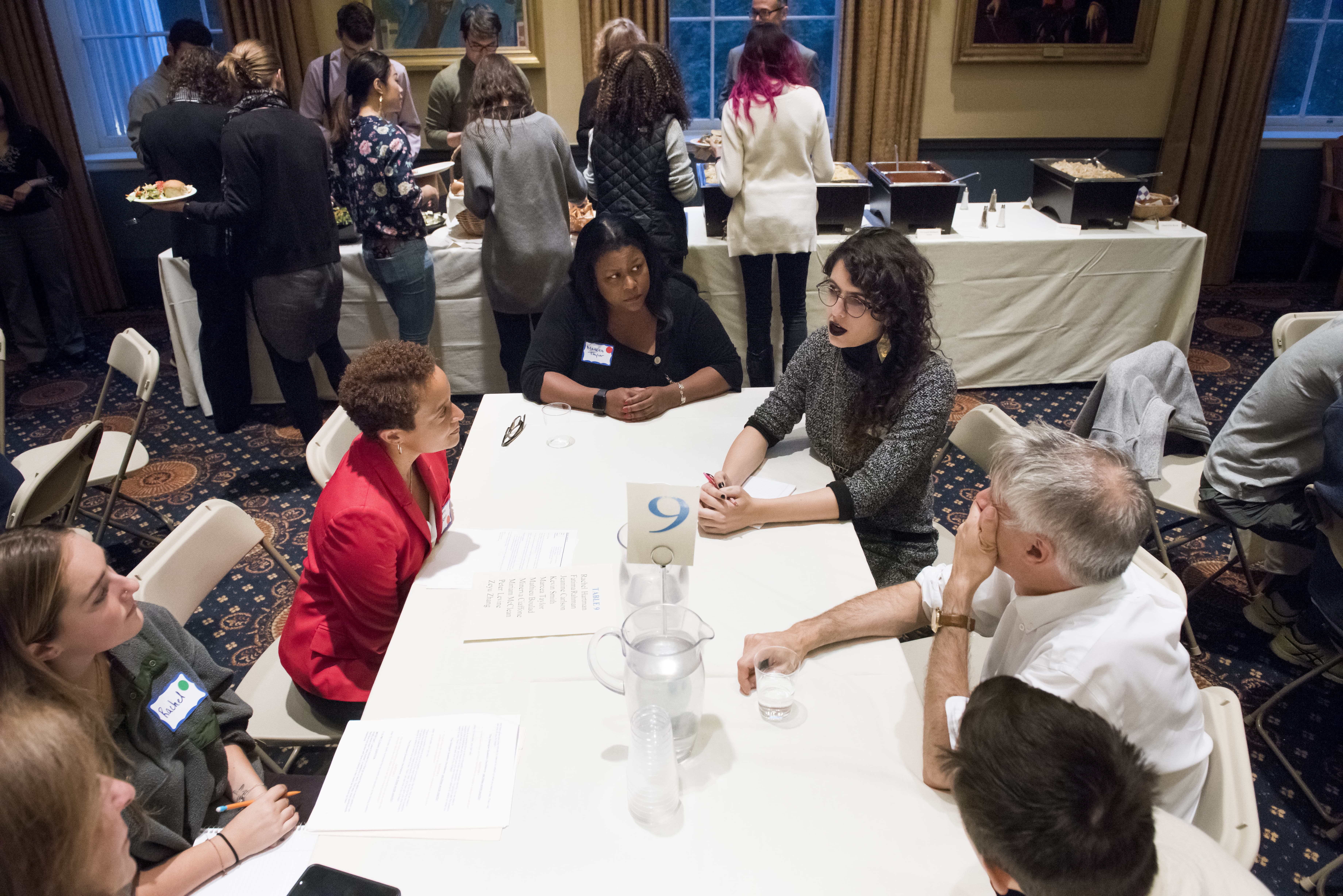 Tufts students, faculty, and staff gather to discuss topics at the first Tufts Table.